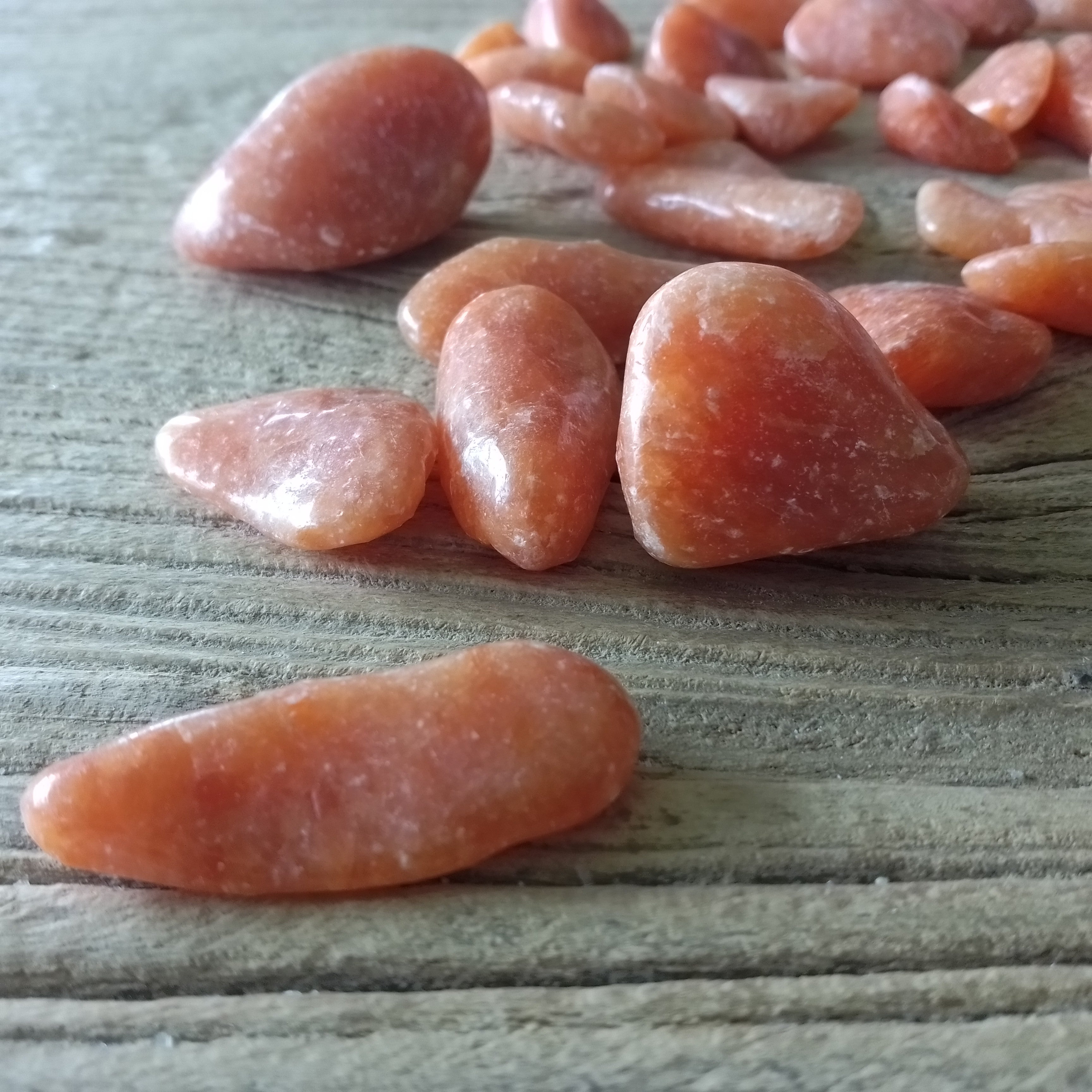 Orange calcite tumblestones