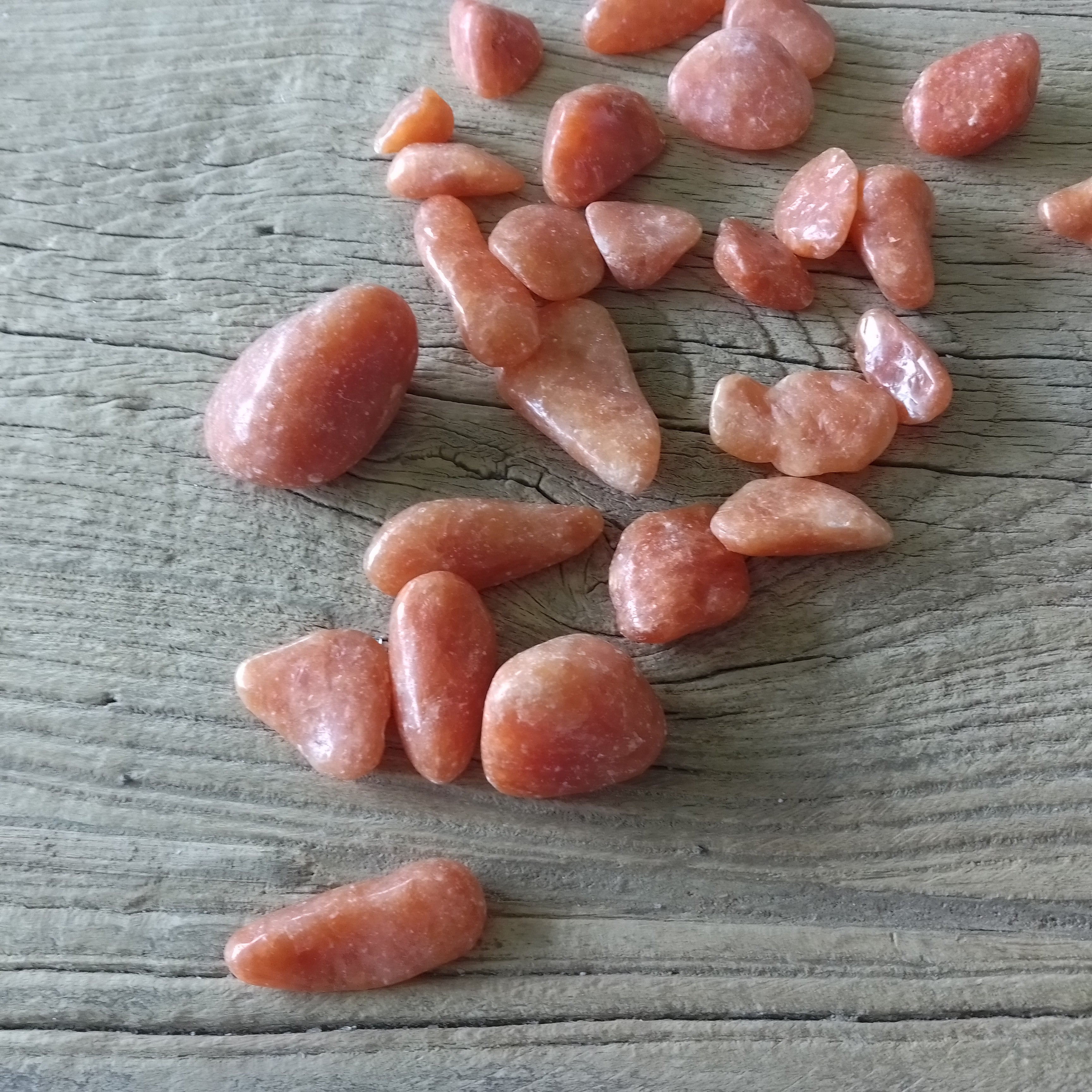 Orange calcite tumblestones